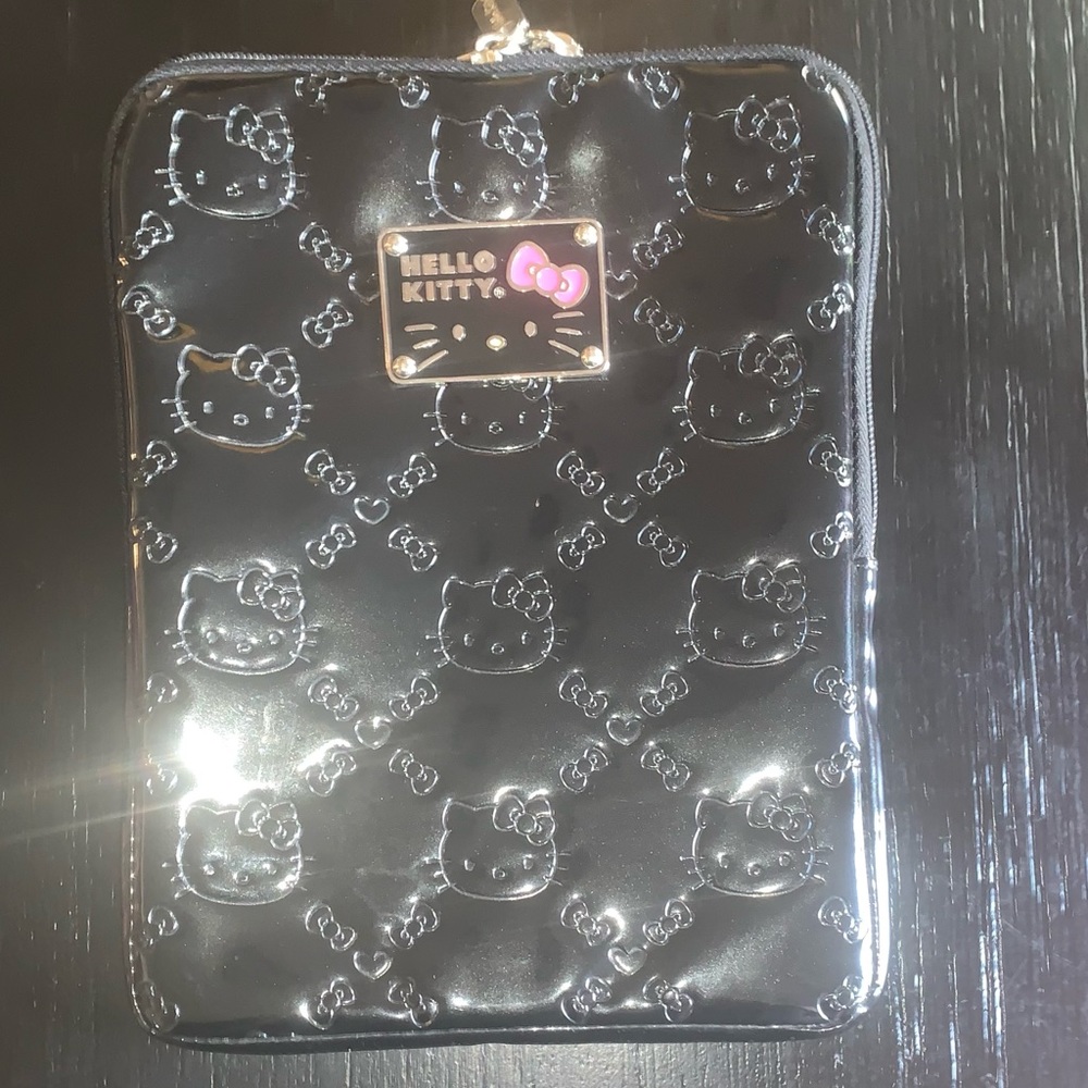 Sanrio X Loungefly iPad black patent leather iPad case.